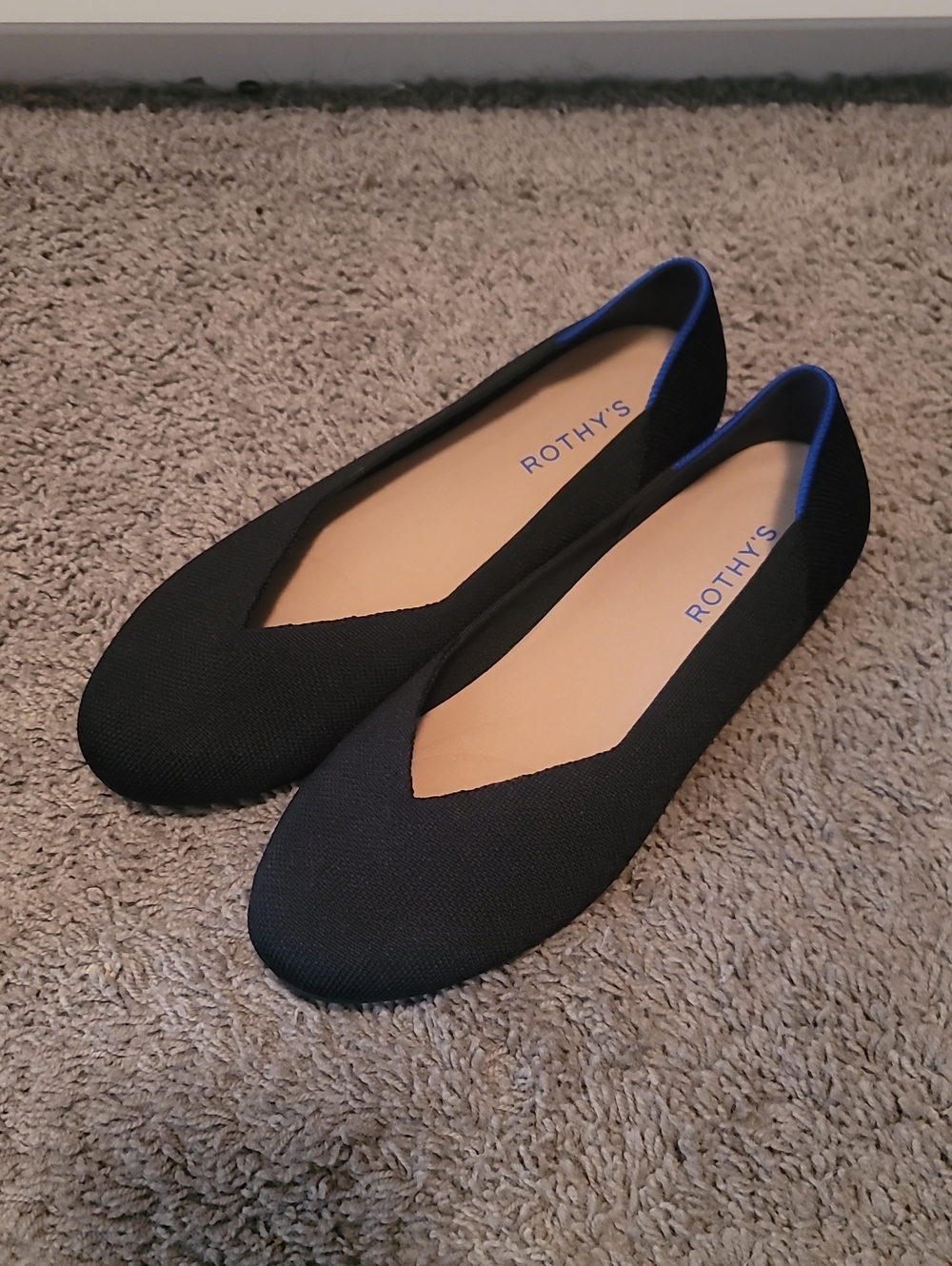 Rothy's Black Pointed V-Cut Flats with Blue Trim